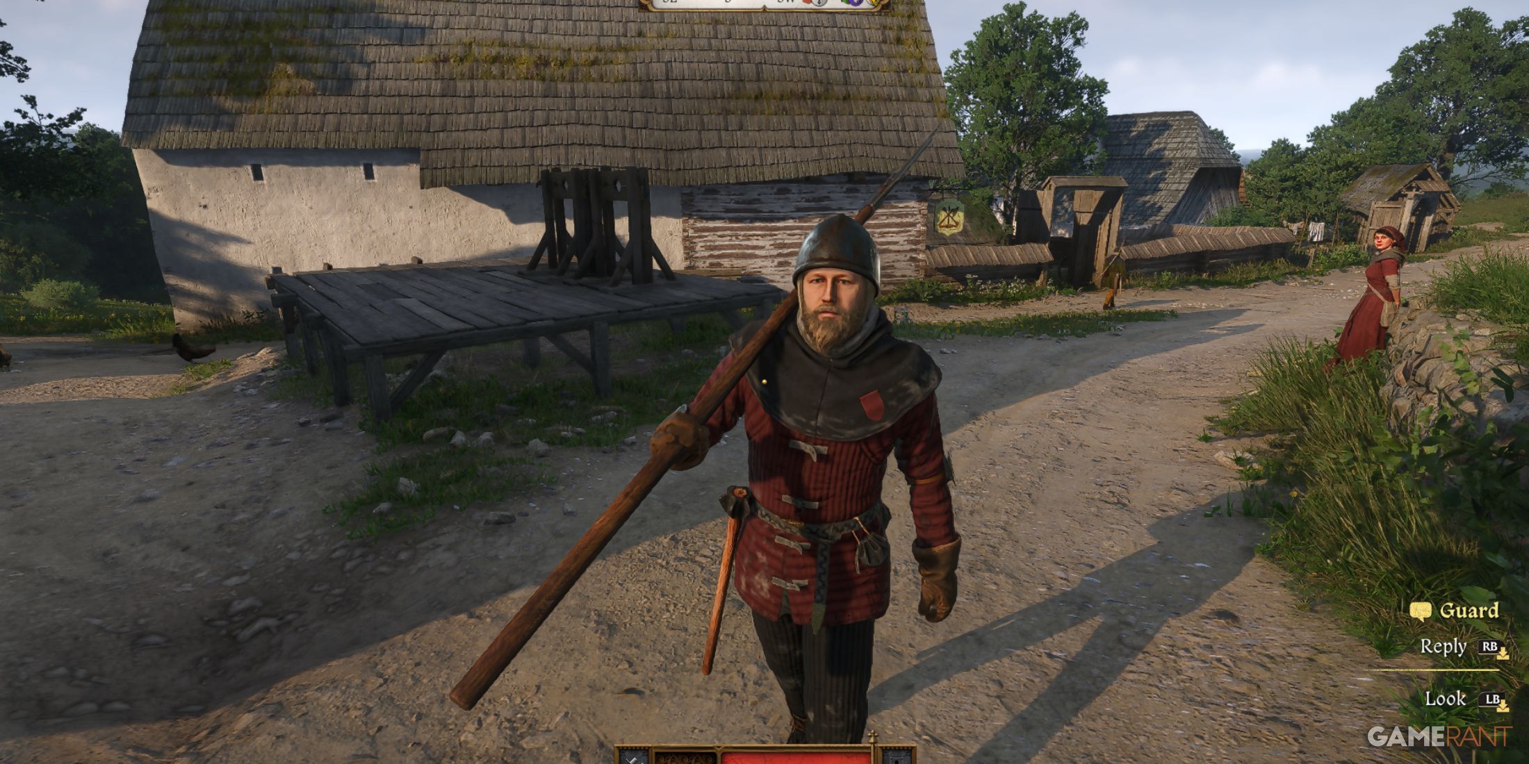 A town guard approaches Henry in a rural village in Kingdom Come Deliverance 2