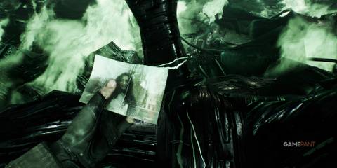 8 Best Games Set in a Nuclear Wasteland, Ranked Holding a picture of a woman with burning green light behind