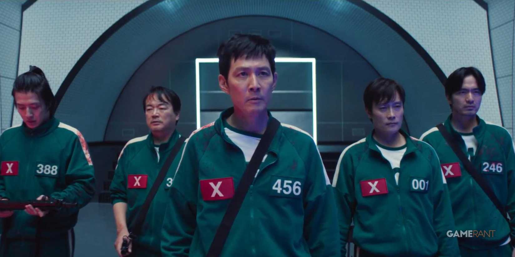 a group of squid game players holding guns in season 2-1