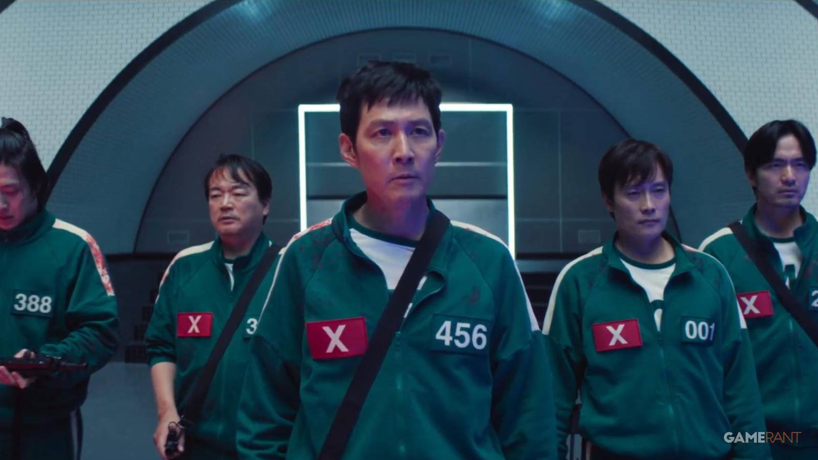 a group of squid game players holding guns in season 2