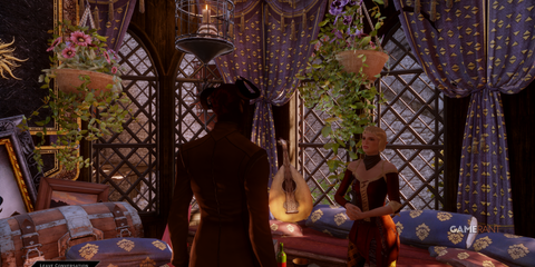 Inquisitor Adaar and Sera in her ornate room at Skyhold