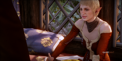 Sera smiling at something the Inquisitor said