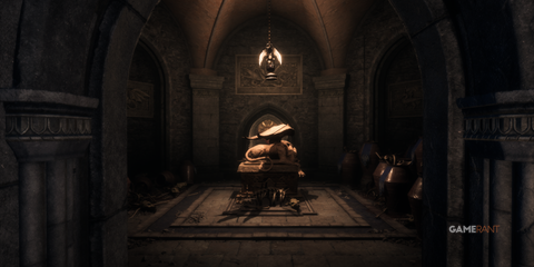 Statue of a griffon surrounded by animal remains in an abandoned Grey Warden structure