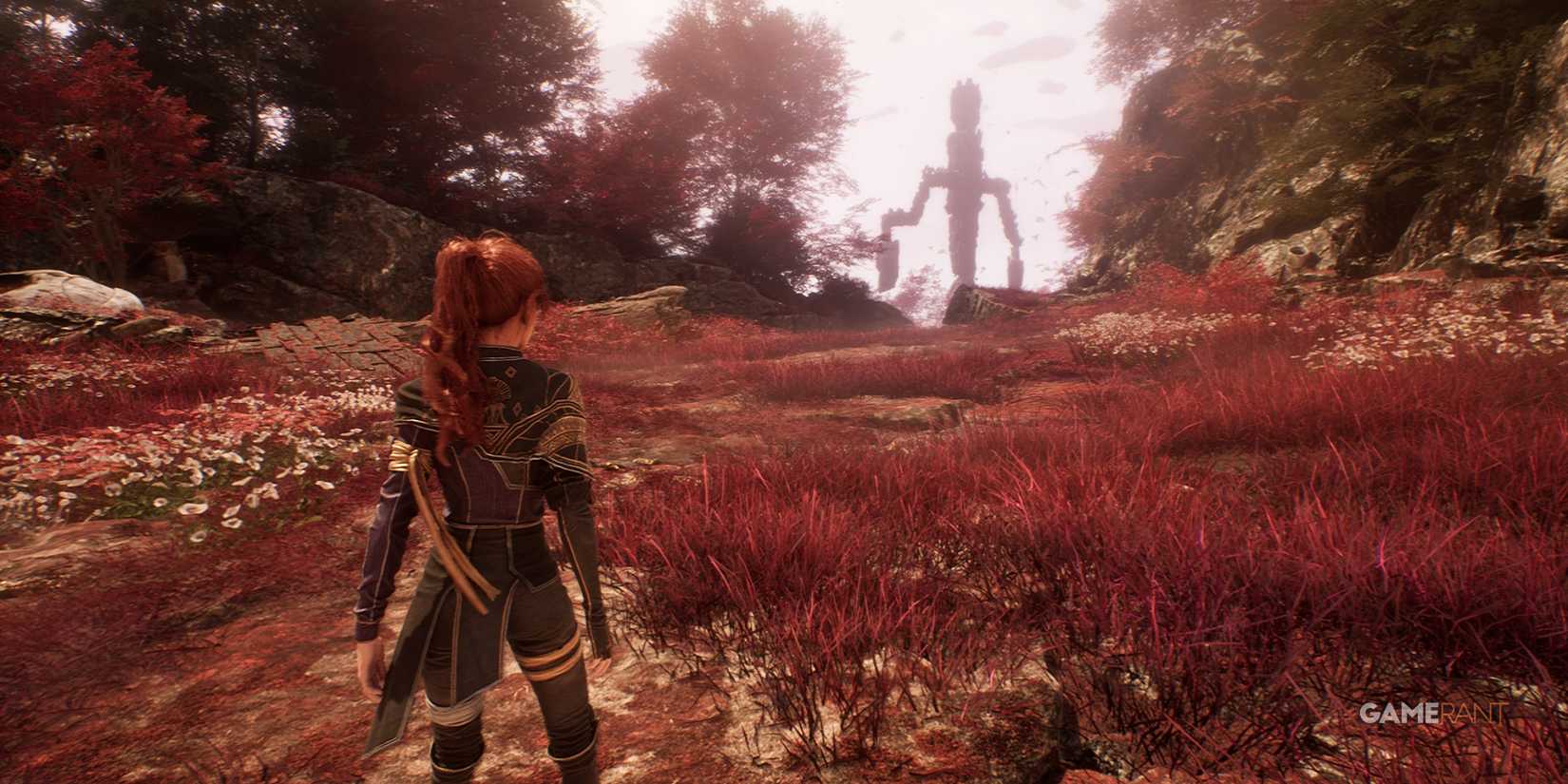 Exploring a rocky cliffside in Clair Obscur Expedition 33, with towering ruins and autumn trees creating a mysterious red forest backdrop