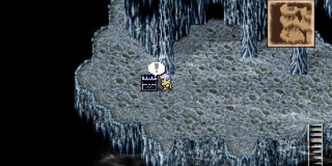 Character finds a chest in the Lunar Subterrane, with a minimap showing the cave layout in Final Fantasy IV Pixel Remaster