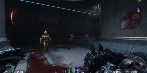 Fighting undead enemies in a dark hall from Doom The Dark Ages, known for its intense combat design