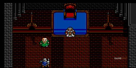 The king sits on his throne inside the castle surrounded by advisors in Shining Force 2