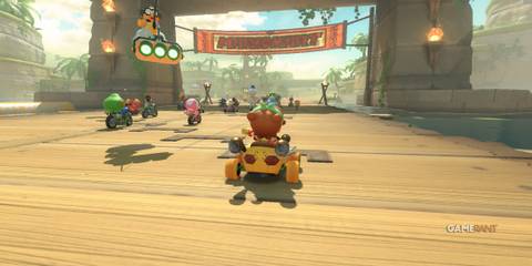 Baby Peach starts in last place, preparing to sandbag and collect strong items in Mario Kart World