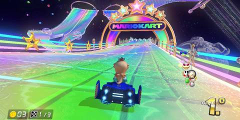 Mario Kart Wii’s Rainbow Road stuns with loops, starlight arches, and high-speed sections above the cosmos