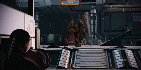 10 Best Third-Person Shooters of the 2010s, Ranked Shepard aiming at a large mech