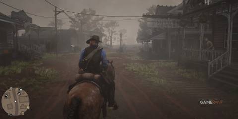 Arthur riding through town in Red Dead Redemption 2