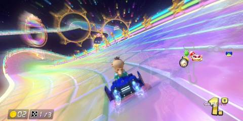 The vibrant tiles and space backdrop make Mario Kart Wii’s Rainbow Road a visual and gameplay rollercoaster