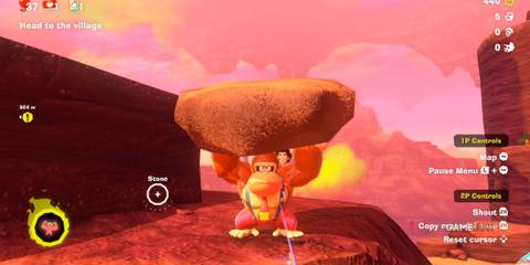 DK lifts a massive boulder with Pauline on his back in DK Bananza, a co-op move not seen in Super Mario Odyssey