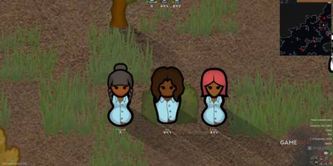 Useful Marks adds status icons above pawns; three colonists show badges identifying roles, health, and equipment state
