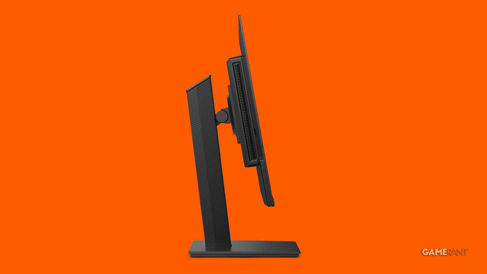 Edited image of Alienware AW2726DM taken from the side on an orange background