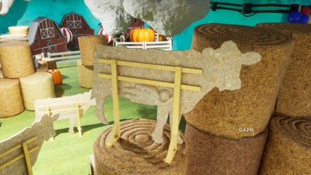 meccha chameleon player hides on the back of a plywood cow camoflauged